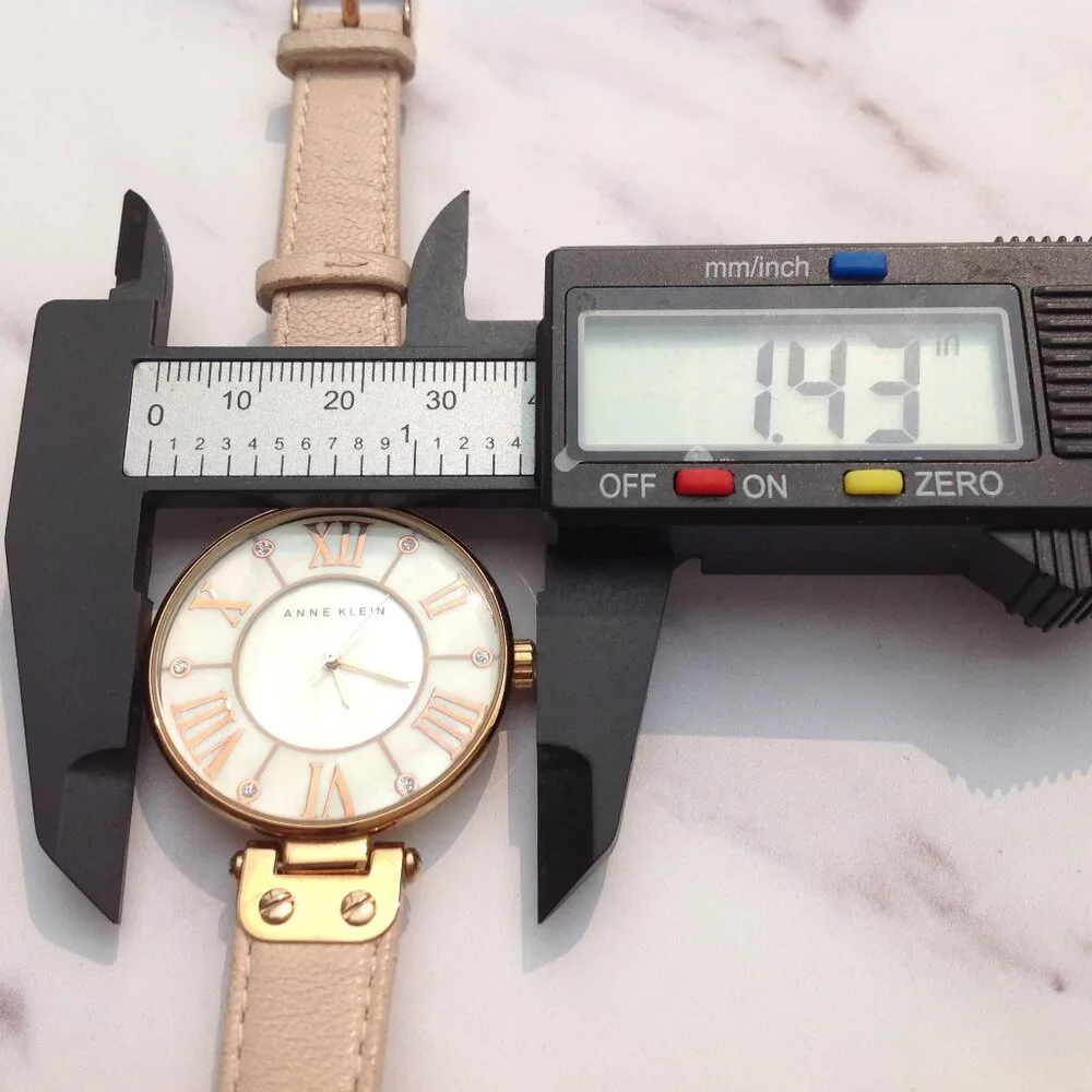 Anne Klein Quartz Wrist Watch MOP Face and Rose Gold & Arabic Numerals